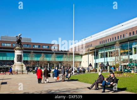 People sat in Eldon Square Shopping centre gardens Newcastle upon tyne tyne and wear tyneside england gb uk eu europe Stock Photo