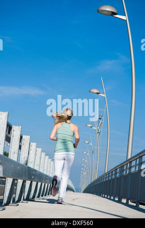 Young Woman Running, Worms, Rhineland-Palatinate, Germany Stock Photo