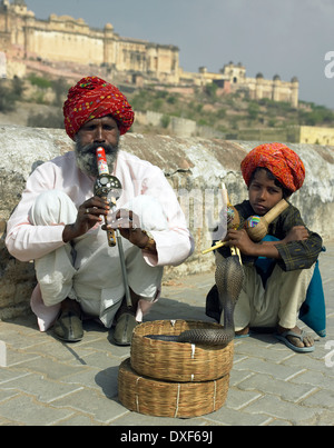 Indian snake charmers in front of the Amber Fort in Jaipur in the state of Rajasthan in western India. Stock Photo