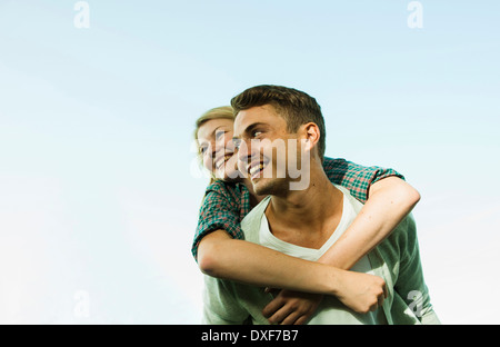 Young Man giving Young Woman Piggyback Ride, Mannheim, Baden-Wurttermberg, Germany