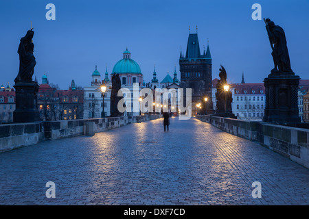 dawn on the Charles Bridge with the towers and spires of the Old Town beyond, Prague, Czech Republic