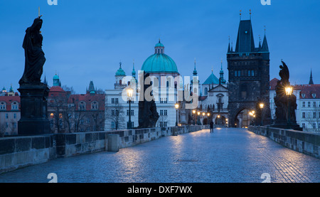 dawn on the Charles Bridge with the towers and spires of the Old Town beyond, Prague, Czech Republic