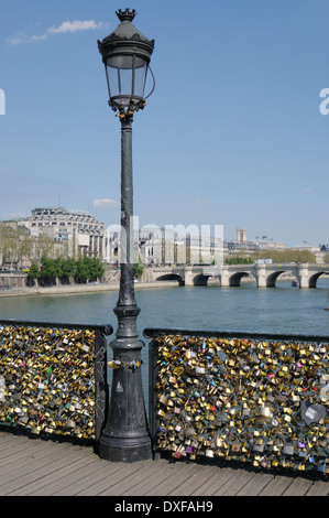 Street Lamp and Love Locks, Pont des Arts, Paris, France Stock Photo