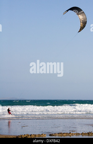 Kite surfing off Great Western Beach at Newquay in Cornwall in the United Kingdom Stock Photo