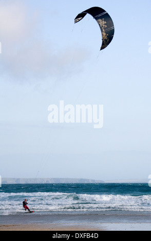 Kite surfing off Great Western Beach at Newquay in Cornwall in the United Kingdom Stock Photo