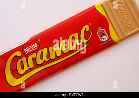 bar of Nestle Caramac chocolate set on white background - looking down on from above