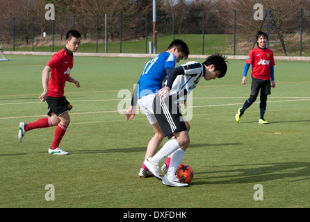 Students playing a practise game of football, Warwick University, UK Stock Photo