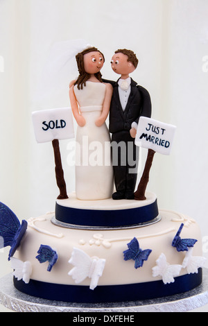Decoration on the top of a wedding cake. Stock Photo