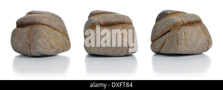 Gray and brown furrowed stone isolated. Set of photos of the same sandstone from different angles. Stock Photo