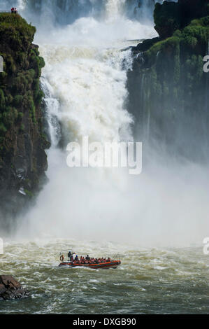 Jetboat underneath the Iguazú Falls, Iguazú National Park, UNESCO World Heritage Site, Argentina Stock Photo