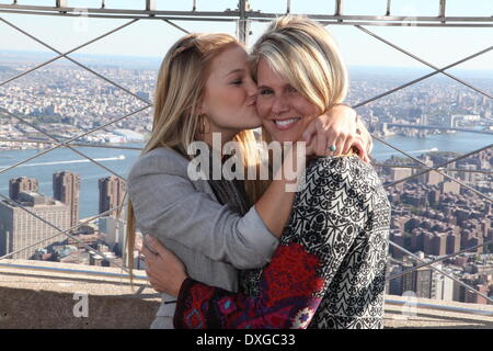 Olivia Holt with her mom Kim Holt Disney star Olivia Holt attends a photocall on the 86th-floor observation deck of the Empire State Building Featuring: Olivia Holt with her mom Kim Holt Where: New York City, NY, United States When: 11 Oct 2012 Stock Photo