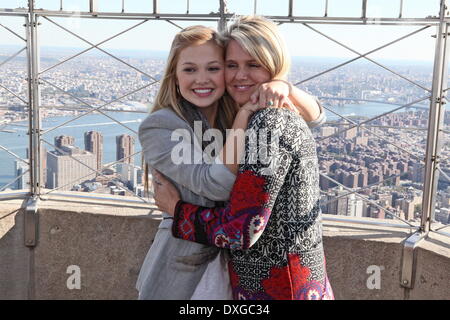 Olivia Holt with her mom Kim Holt Disney star Olivia Holt attends a photocall on the 86th-floor observation deck of the Empire State Building Featuring: Olivia Holt with her mom Kim Holt Where: New York City, NY, United States When: 11 Oct 2012 Stock Photo