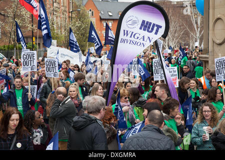 Manchester, UK  26th March, 2014.  Greater Manchester Police policing the teachers Day of Action.  Hundreds of teachers across the North West out on strike on Wednesday. over pay, pension cuts and working conditions. Teachers have been holding a number of rallies across the North West as part of their industrial action. Stock Photo