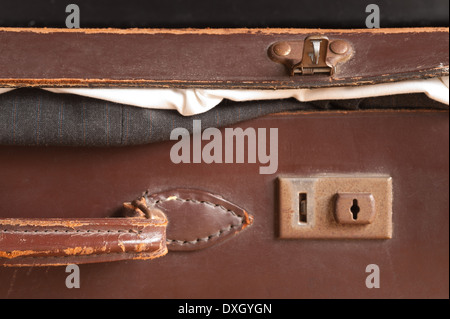 old fashioned leather handmade suitcase with latches lock and handle used by doctor formal statement Stock Photo