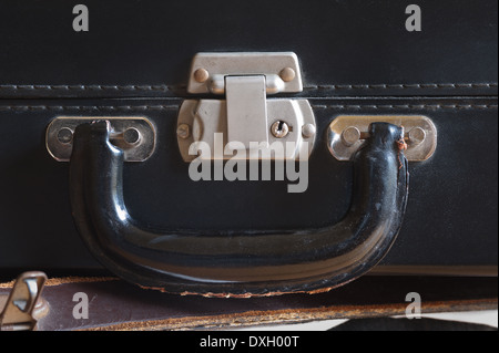 old fashioned leather handmade suitcase with latches lock and handle used by doctor formal statement Stock Photo