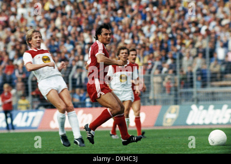 football, Bundesliga, 1983/1984, Rhine Stadium, Fortuna Duesseldorf versus Hamburger SV 2:3, scene of the match, Gerd Zewe (Fortuna) left and Felix Magath (HSV) 2.f.l. Stock Photo