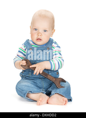 Small cute baby boy worker in jeans. Isolated on white background Stock Photo