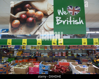 'We Love British' produce above fruit and veg vegetable display inside Lidl supermarket store England UK KATHY DEWITT Stock Photo