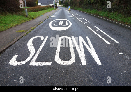 30 mph speed limit sign painted on road Stock Photo