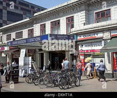 People in summer outside historic Farringdon railway station, London, England Stock Photo