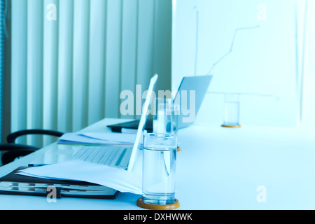 Laptop put on Table in Indian Office Stock Photo