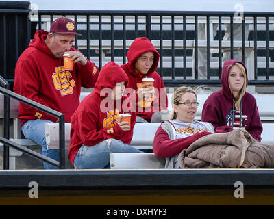 March 26, 2014 - Orlando, FL, U.S: Bethune Cookamn fans attempt to stay warm during NCAA baseball game action between the Bethune Cookman Wildcats and the UCF Knights. UCF defeated BCU 4-1 at Jay Bergman Field in Orlando, FL Stock Photo