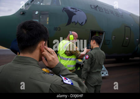 Canberra. 25th Mar, 2014. A South Korean Air Force C-130 Hercules arrives at the Royal Australian Air Force Base Pearce in west Australia to support the Australian Maritime Safety Authoirty-led search for Malaysia Airlines flight MH370 on March 25, 2014. © Australian Department of Defense/Xinhua/Alamy Live News Stock Photo