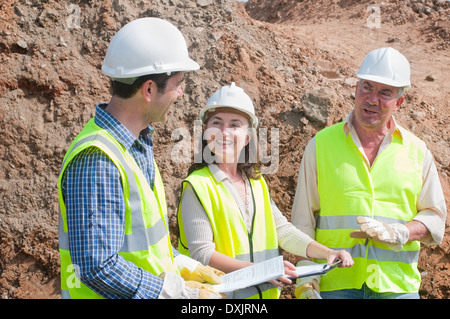 three engineers in construction site Stock Photo