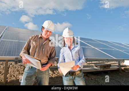 engineers in solar plant Stock Photo