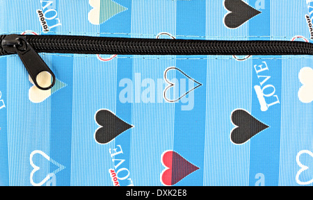 Heart pattern and top zip on wallet for background. Stock Photo