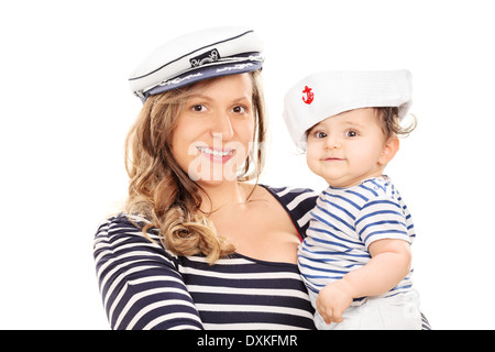 Mother and her baby daughter in sailor uniform Stock Photo