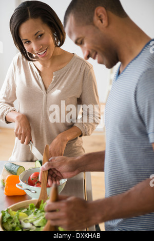 Couple preparing salad Stock Photo