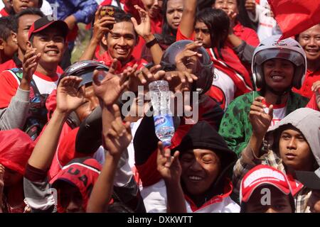 Semarang, Indonesia. 27th Mar, 2014. MARCH 27: The supporters of the Indonesia Democratic of Struggle Party attend a legislative campaign on March 27, 2014 in Semarang, Central Java, Indonesia. Indonesian elections will be legislative eection held on April 9, 2014 while voting to Indonesia President election held July 9, 2014. Indonesia election followed by 12 parties with 180 million voters to take the part. Credit:  Sijori Images/ZUMAPRESS.com/Alamy Live News Stock Photo