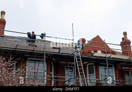 House Roof Repairs Stock Photo