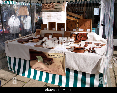 Handmade leather goods being sold at Dartmouth Market, Devon, UK Stock Photo