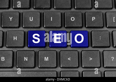 blue SEO or search engine optimization word on keyboard Stock Photo