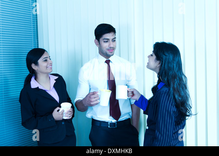 Indian Business People Drinking Tea Stock Photo