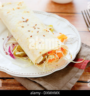 pita bread with salad in the middle, food closeup Stock Photo