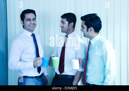 Indian BusinessMen Drinking Tea and talking Stock Photo