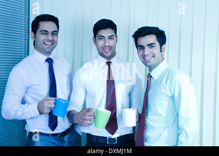Indian BusinessMen Drinking Tea and talking Stock Photo