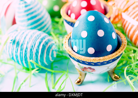Selective focus on the front dotted blue egg  Stock Photo