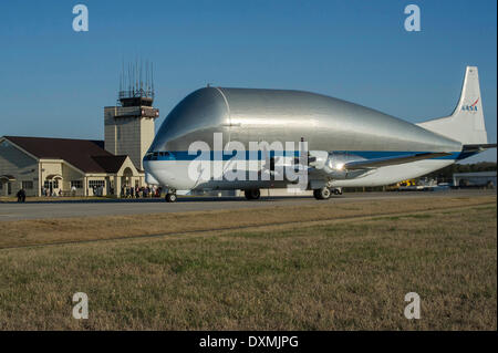 NASA's Super Guppy, a specially designed wide-bodied cargo aircraft lands at the Redstone Army Airfield March 26, 2014 in Huntsville, Alabama. The aircraft delivered a high tech Cryogenic fuel tank for testing at the Marshall Space Flight Center critical to the future of deep space exploration. Stock Photo