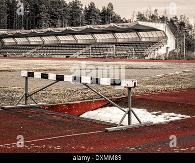 Snow in steeplechase water pit Stock Photo