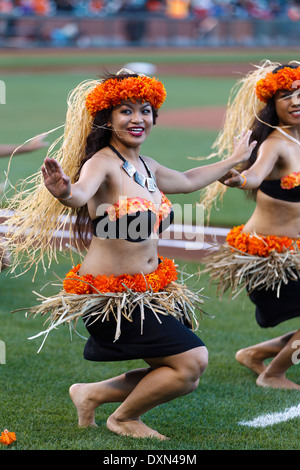 A Polynesian dance troupe performs Tahitian style dances Stock Photo