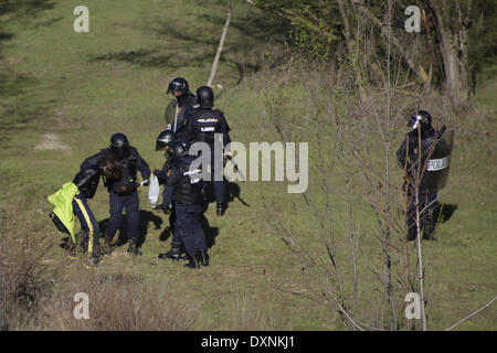 Madrid, Spain. 27th Mar, 2014. a sudent is been arrested by the riot police during the second day of student strikes to protest against the government education reform and cutbacks in grants and staffing, at Complutense University in Madrid, Spain, Thursday, March 27, 2014. Credit:  Rodrigo Garcia/NurPhoto/ZUMAPRESS.com/Alamy Live News Stock Photo