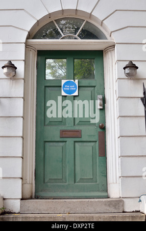 Street door used as a fire exit, Islington, London, UK. Stock Photo