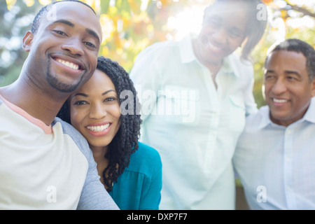 Portrait of smiling couple with parents Stock Photo