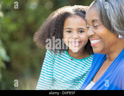 Close up portrait of happy granddaughter with grandmother Stock Photo