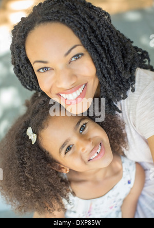 Close up portrait of happy mother and daughter Stock Photo