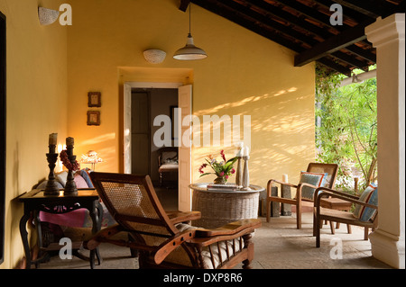 Outdoor seating on veranda of home in the Indian state of Goa Stock Photo